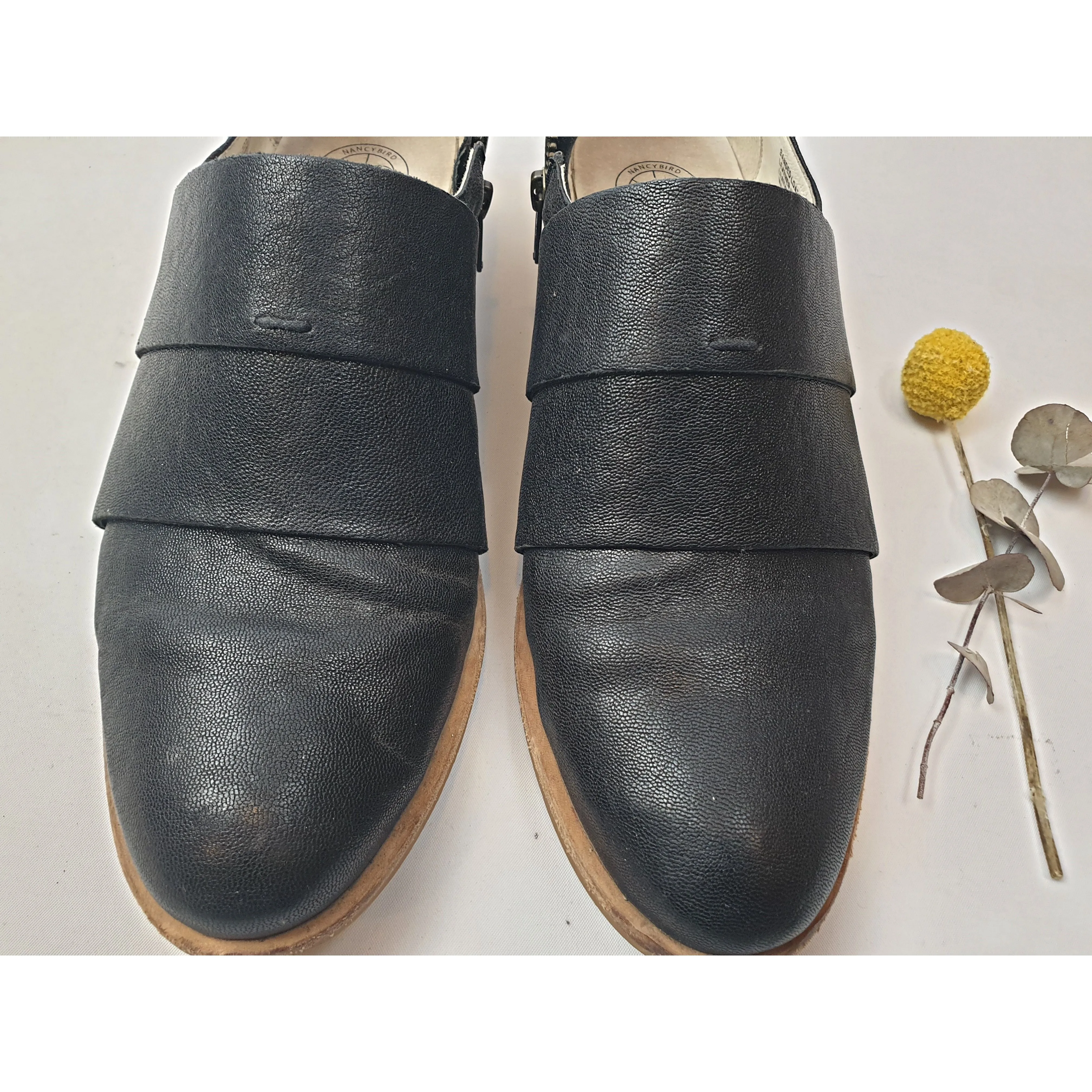 Nancybird black leather shoes with unique and subtle horizontal leather detail size 42