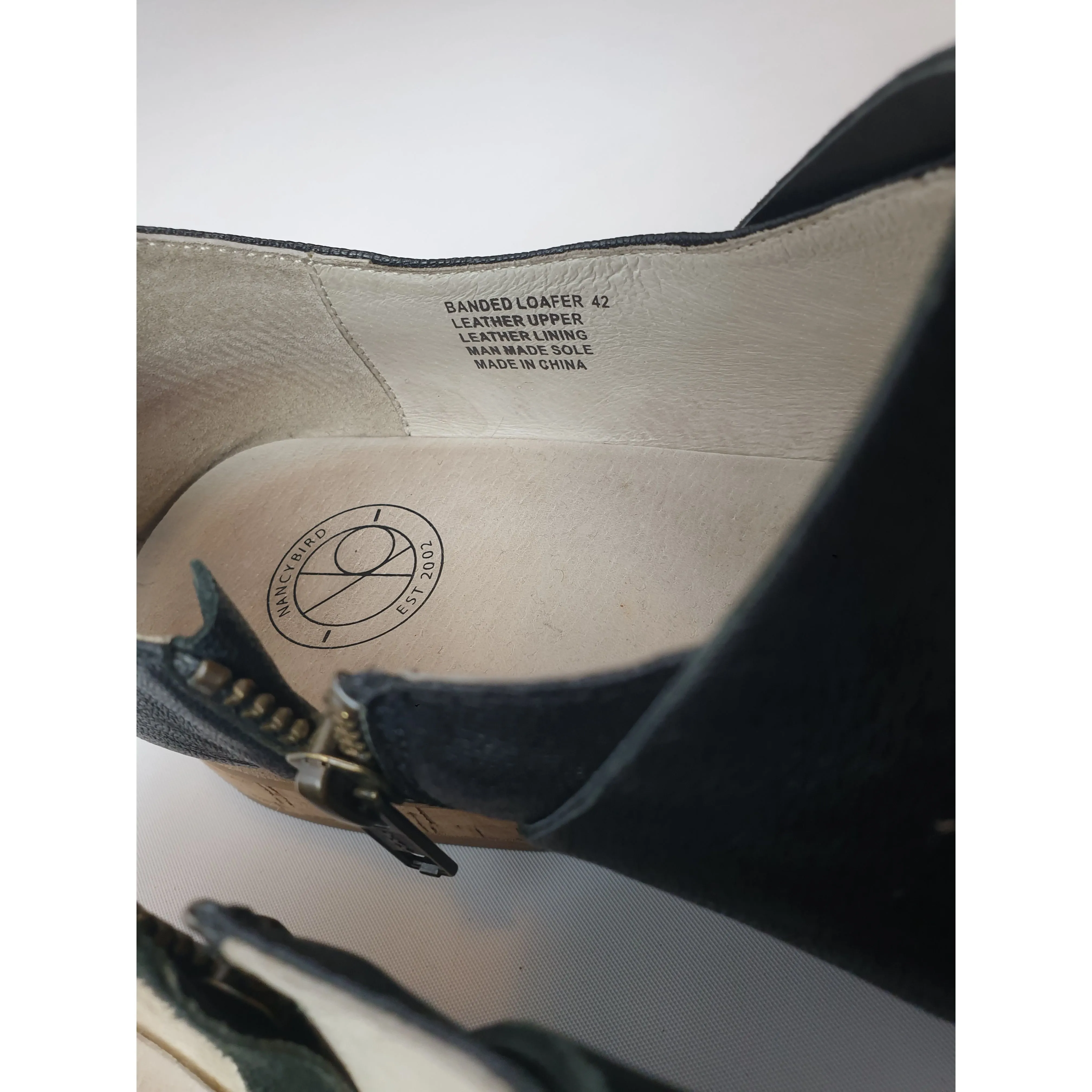 Nancybird black leather shoes with unique and subtle horizontal leather detail size 42