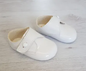 White patent button over soft sole shoes